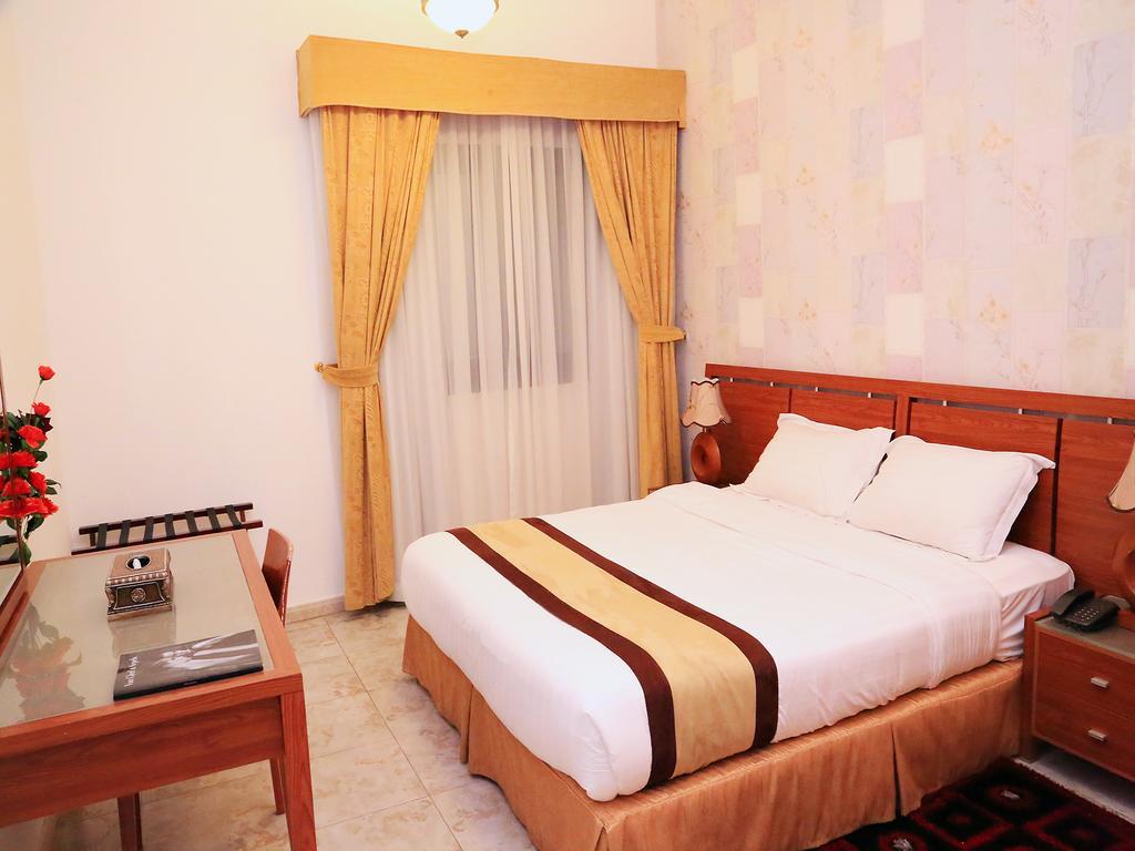 Arcadia Hotel Suites Sharjah Kamer foto
