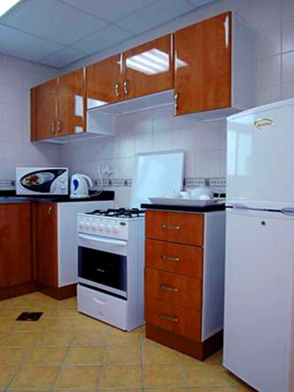 Arcadia Hotel Suites Sharjah Kamer foto